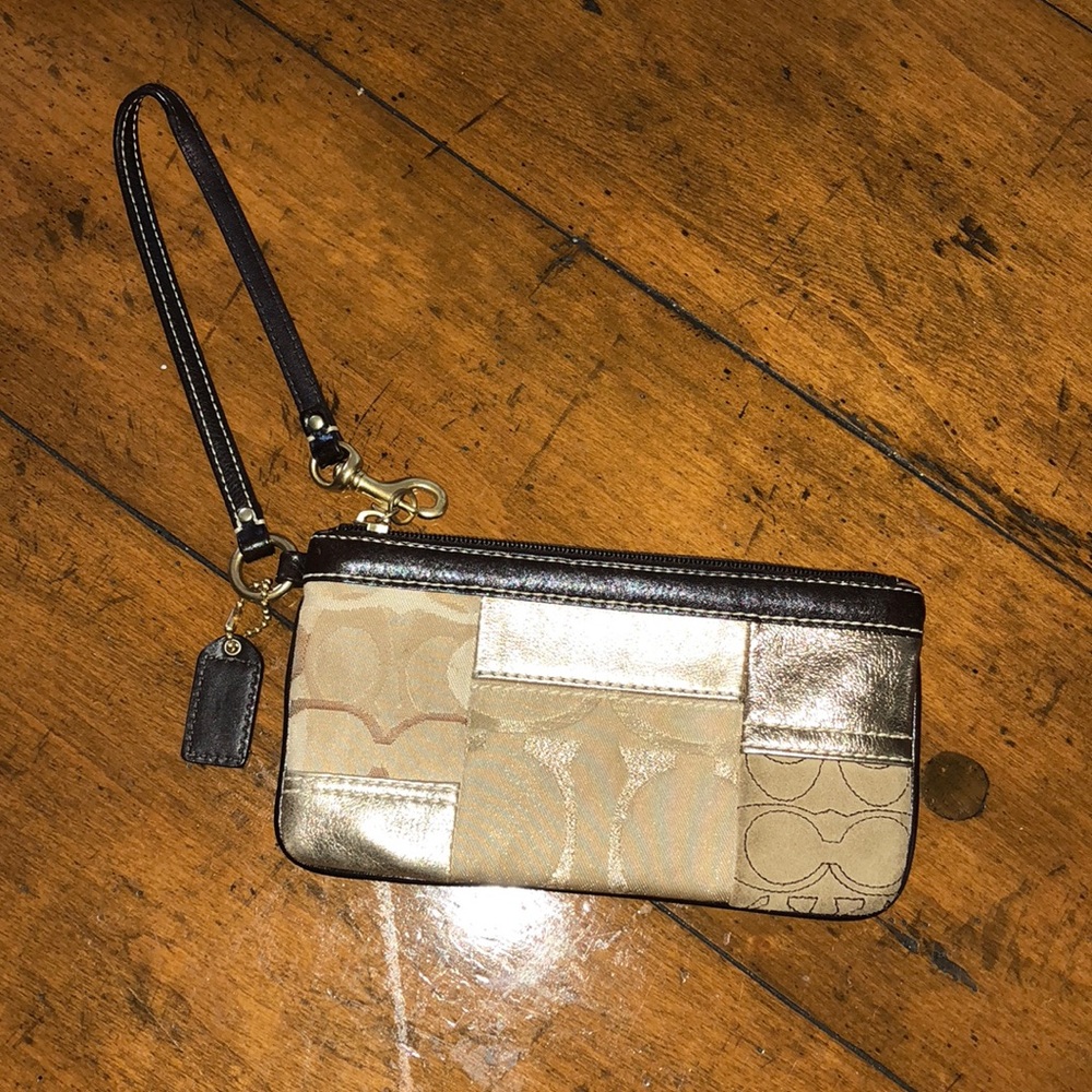 Gold coach wristlet